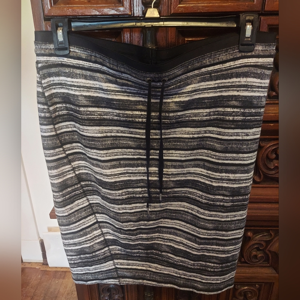 two skirts - black and white pencil, size XL